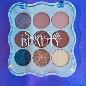 Women’s sugar, silk beauty eyeshadow palette. Nine colors highly pigmented.NWOT